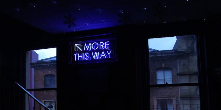 Sign that says 'more this way'