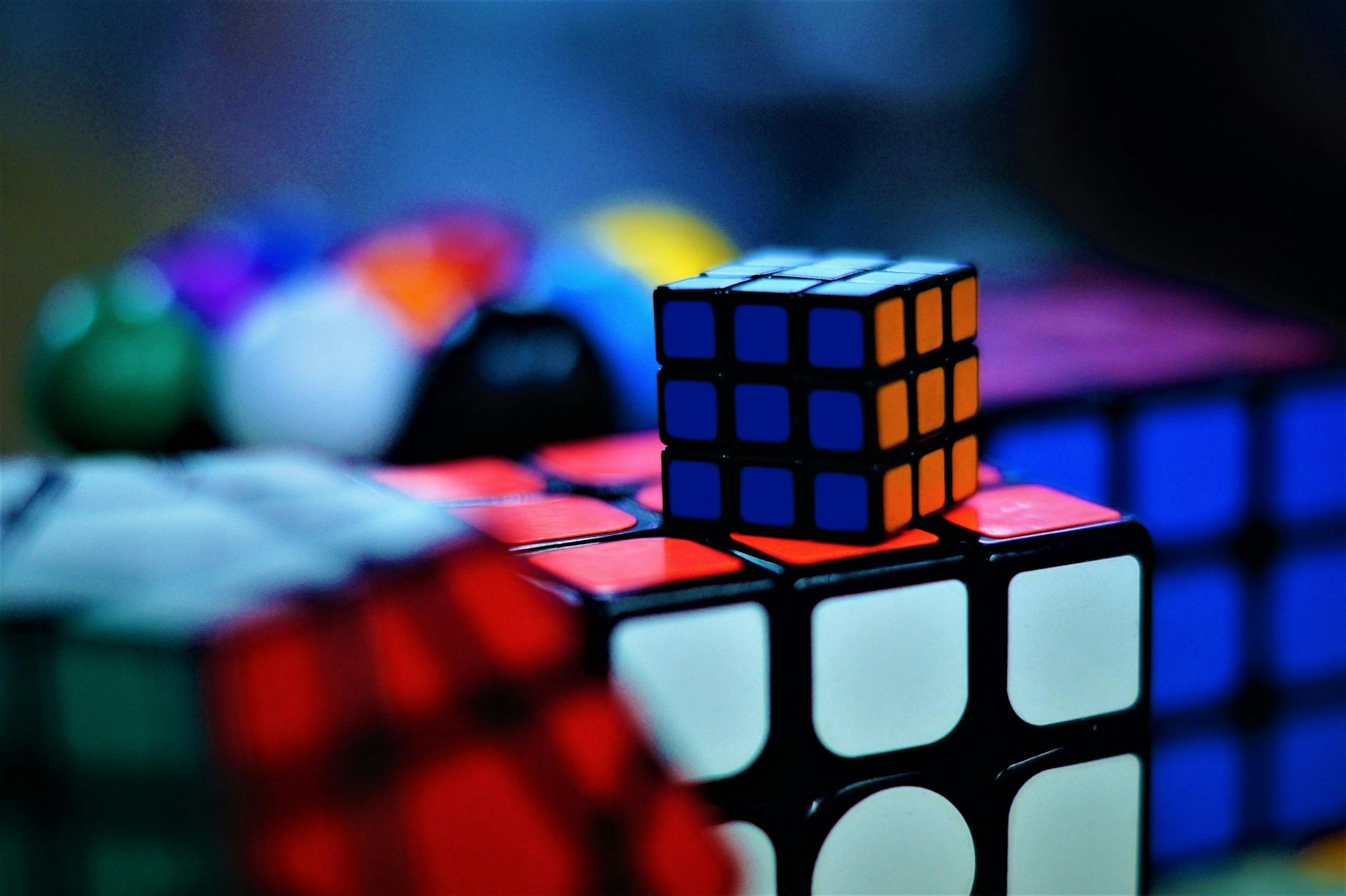 A stack of Rubik's cubes